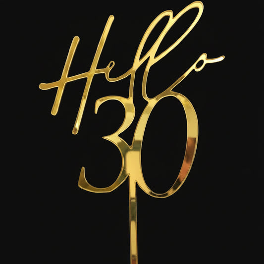 Gold cake topper with 'Hello 30'