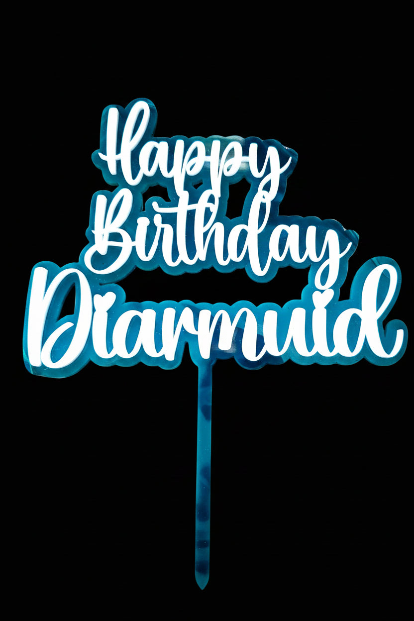 Decorative cake topper with 'Happy Birthday Diarmuid' text