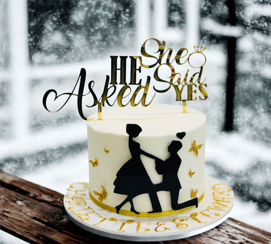 He asked, she said yes! Acrylic wedding cake topper