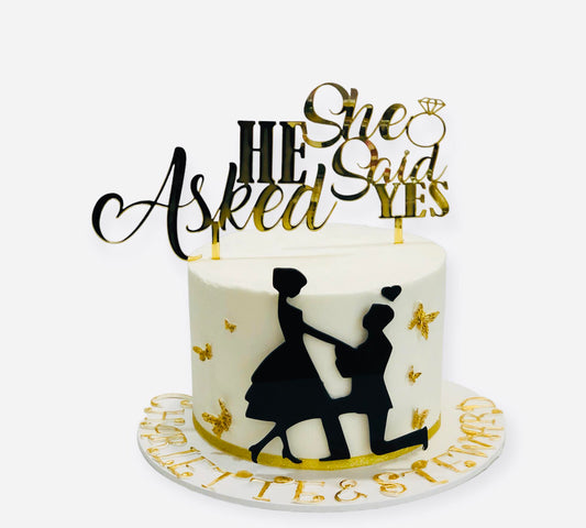 He asked, she said yes! Acrylic wedding cake topper